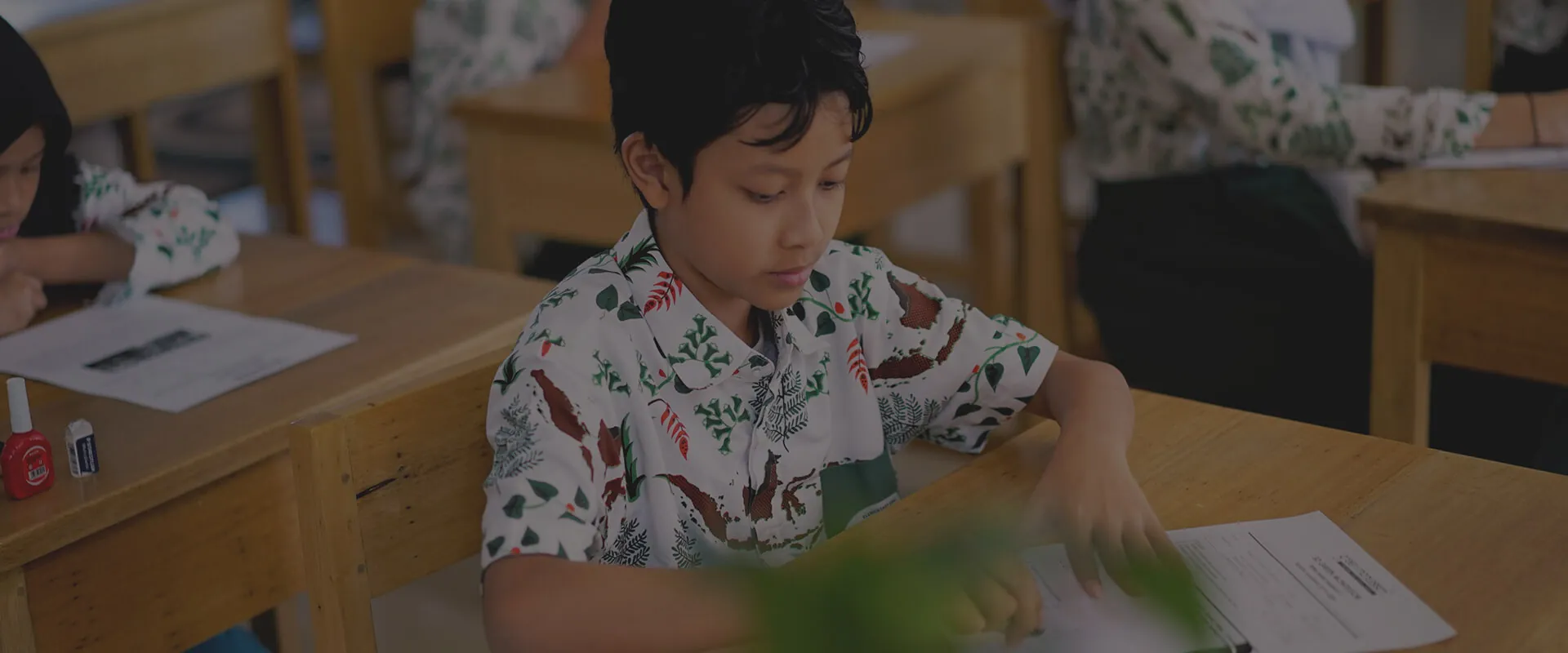 An Elementary student at work in class at Green Montessori School